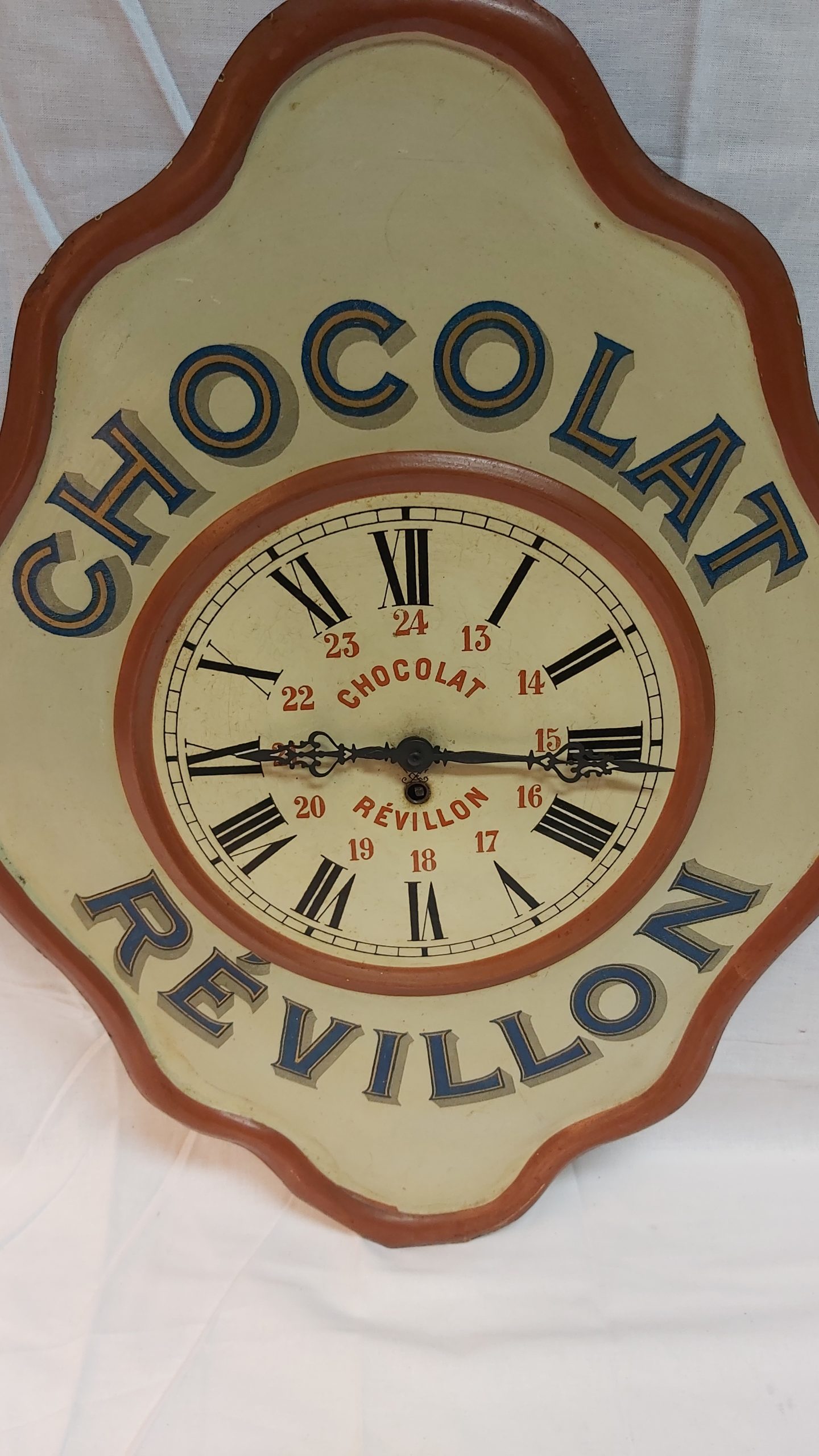 sehr alte Reklameuhr Chocolat Revillon